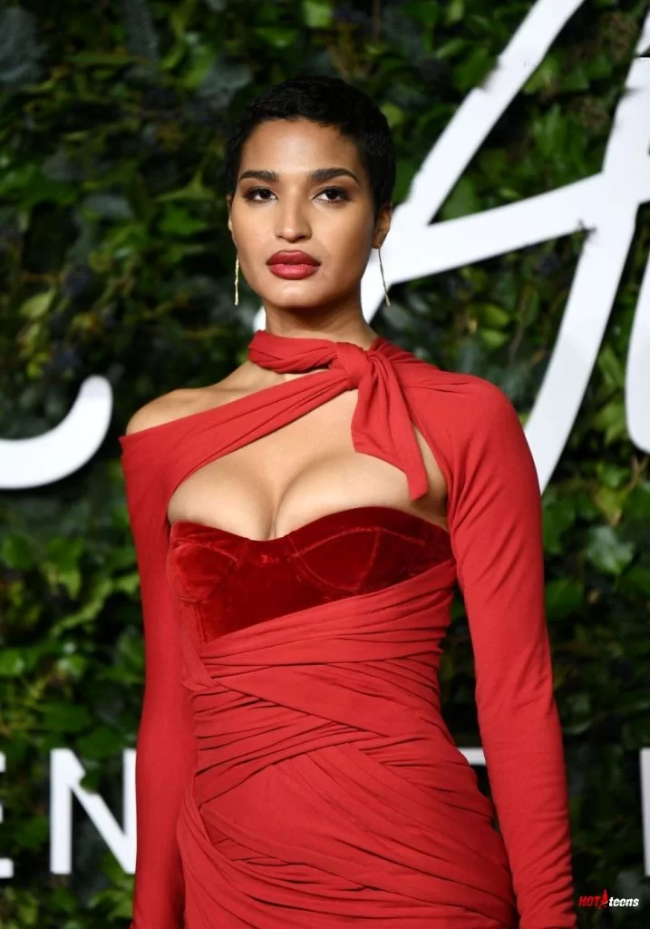 Big tits of Indya Moore in red dress