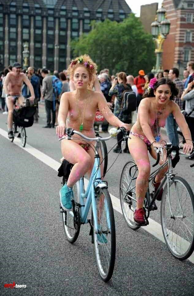 Nude couple in public bike ride event
