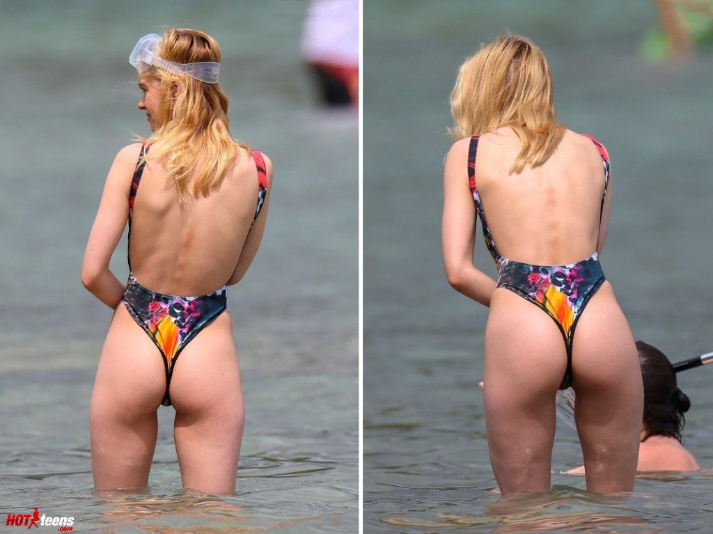Nicola Peltz sexy ass in swimsuit