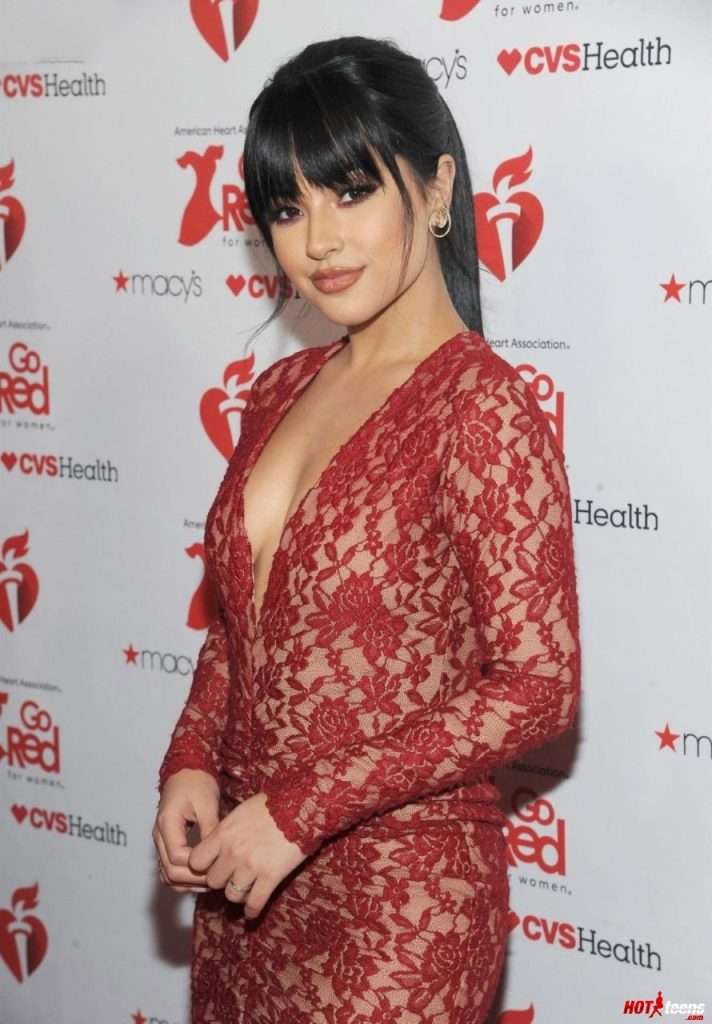 Rebbeca Marie Gomez braless red dress picture