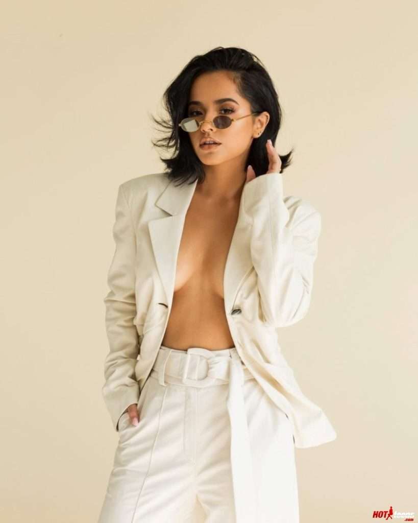 Becky G nude modeling in white suit