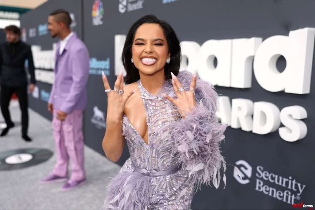 Becky G nude boobs out of dress in public award show
