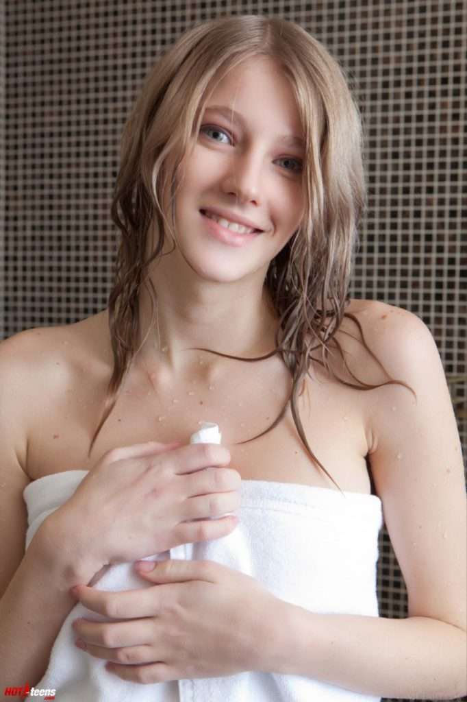 Sexy gal wet after shower