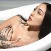 Naked Noah Cyrus in bathtub model photo