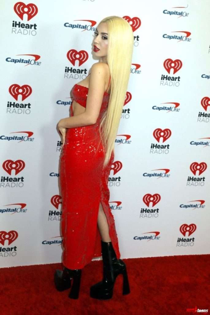 Big booty of Ava Max in red dress