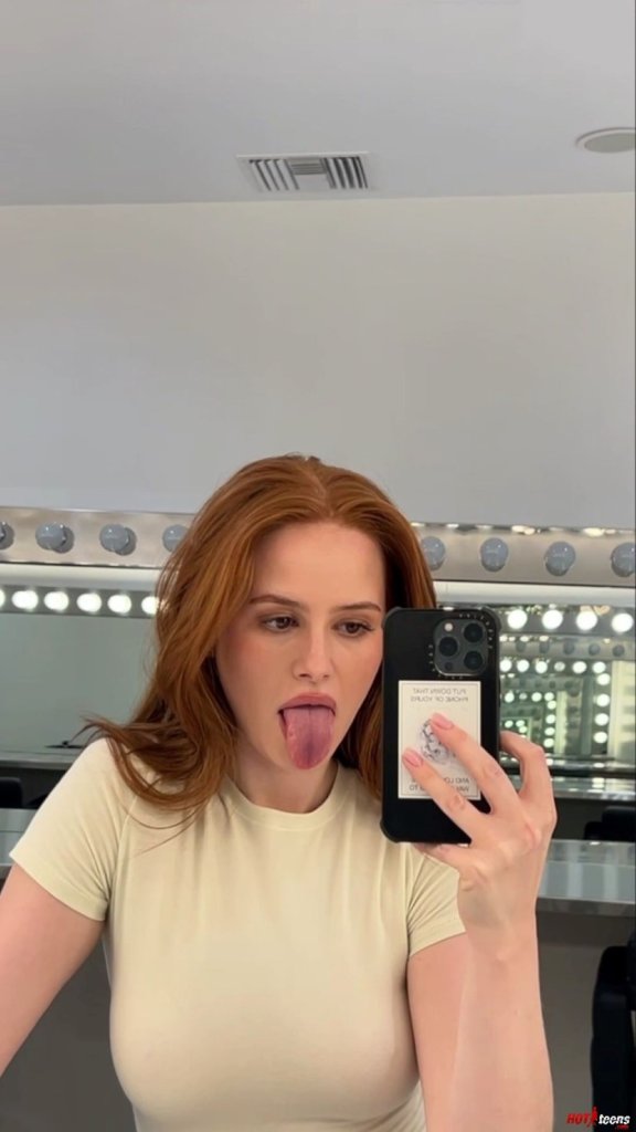 Sexy Madelaine Petsch taking selfies behind the scene